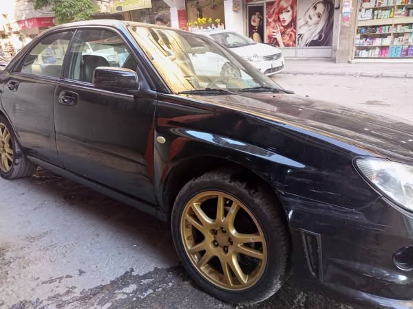سوبارو امبريزا 2005 - صورة 1