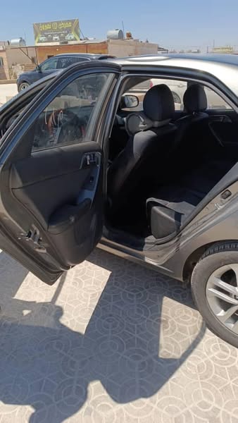 كيا Cerato 2011 - صورة 2