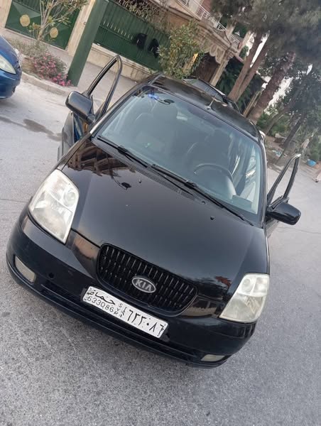 كيا مورنيغ 2005 - صورة 1