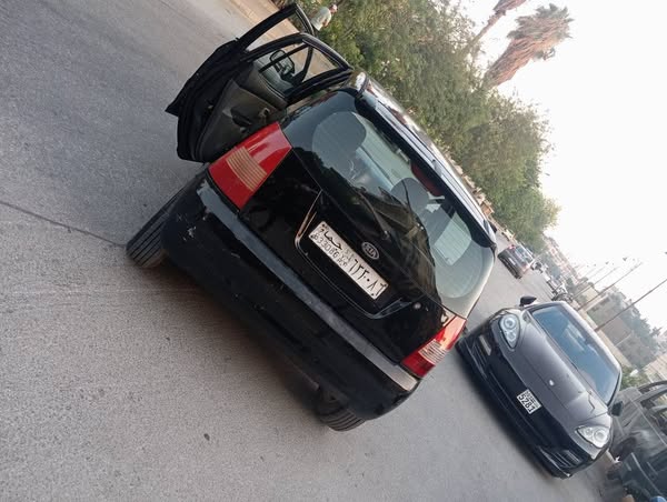 كيا مورنيغ 2005 - صورة 4