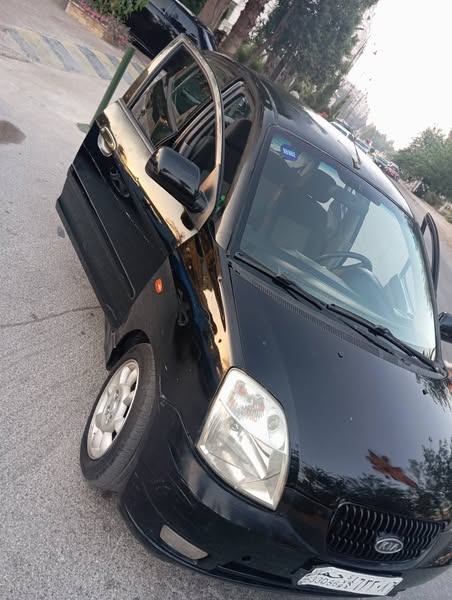 كيا مورنيغ 2005 - صورة 2