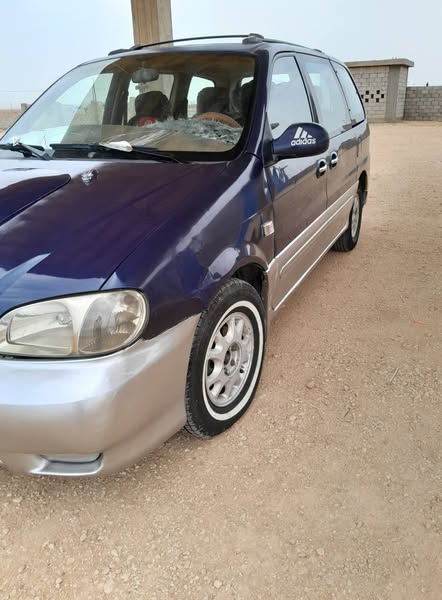 كيا كرنفال 2001 - صورة 2