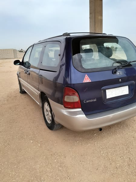 كيا كرنفال 2001 - صورة 4