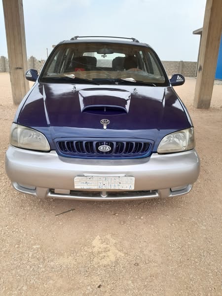 كيا كرنفال 2001 - صورة 1