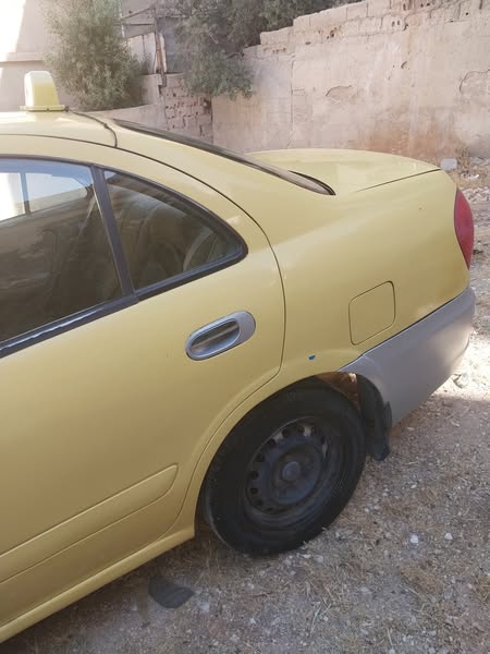 نيسان صني 2012 - صورة 1