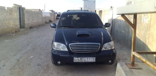 كيا كرنفال 2005 - صورة 3