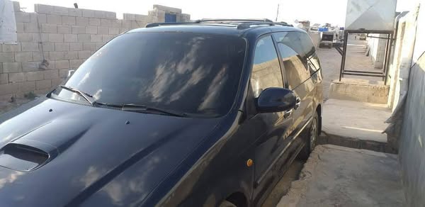 كيا كرنفال 2005 - صورة 4