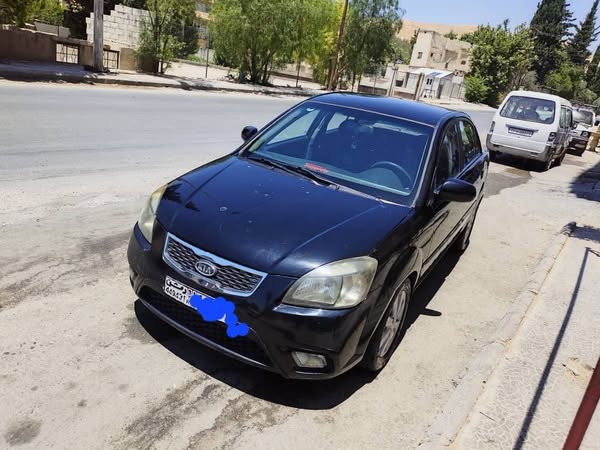كيا ريو 2011 - صورة 2