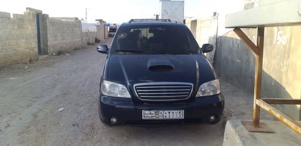 كيا كرنفال 2005 - صورة 1