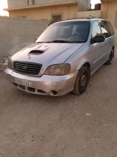 كيا كرنفال 2001 - صورة 1