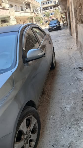 كيا فورتي 2010 - صورة 3