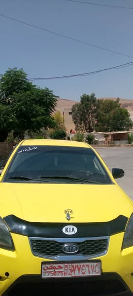 كيا ريو 2011 - صورة 1