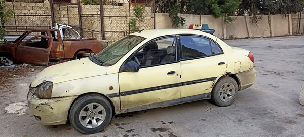 كيا نيو ريو 2001 - صورة 1