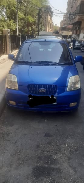 كيا مورنيغ 2005 - صورة 3