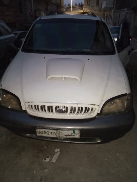 كيا كرنفال 2000 - صورة 1