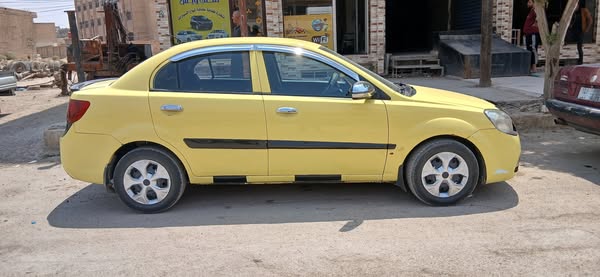 كيا ريو 2011 - صورة 1