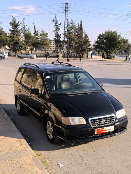 هوندا تراجيت 2003 - صورة 1