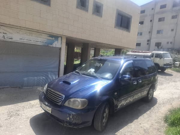 كيا كرنفال 2004 - صورة 1