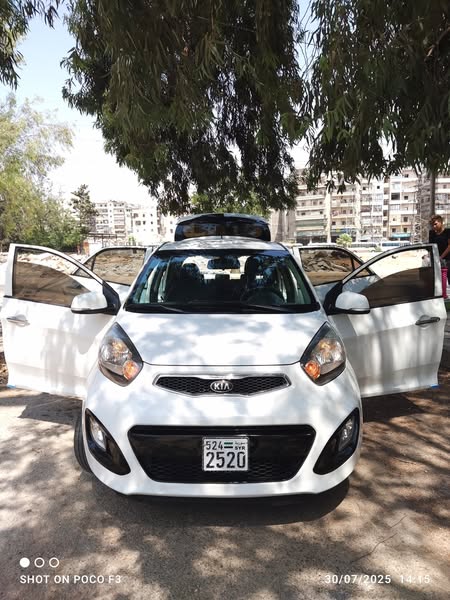 كيا مورنيغ 2015 - صورة 1