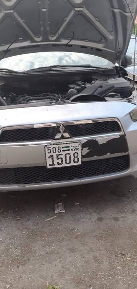ميتسوبيشي لانسر 2015 - صورة 1