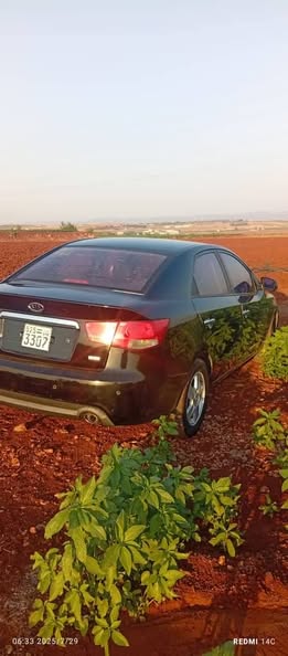 كيا فورتي 2011 - صورة 4