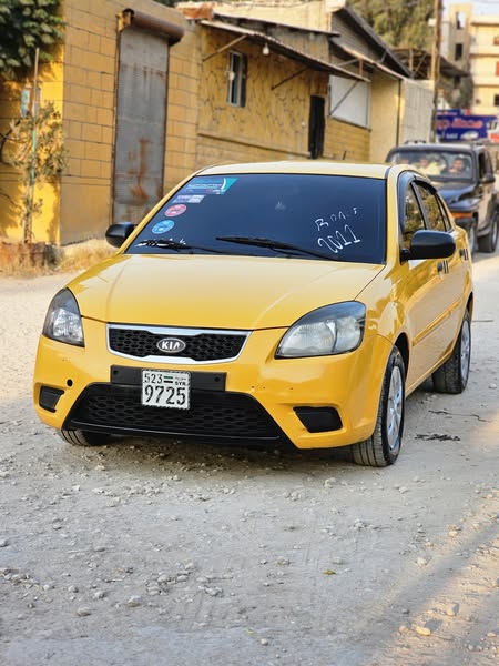 كيا ريو 2011 - صورة 1