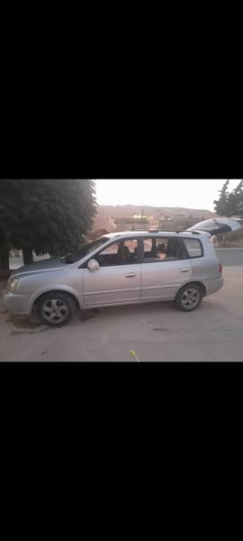 كيا كارينز 2004 - صورة 2