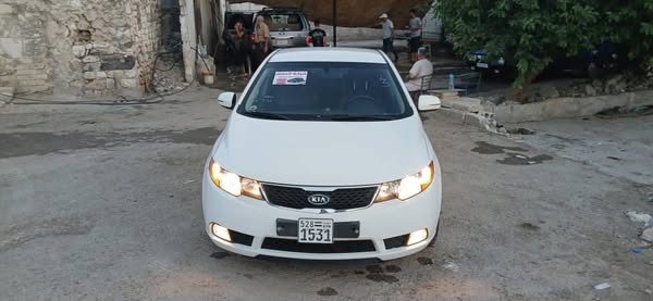 كيا فورتي 2012 - صورة 1