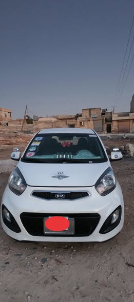 كيا مورنغ 2013 - صورة 1