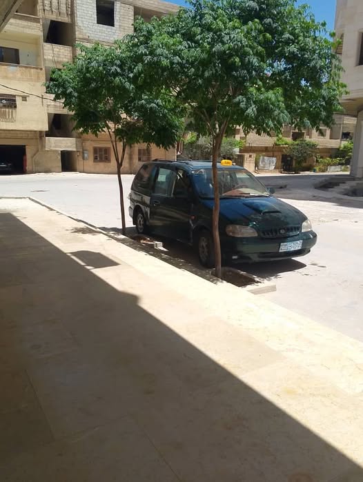 كيا كرنفال 2000