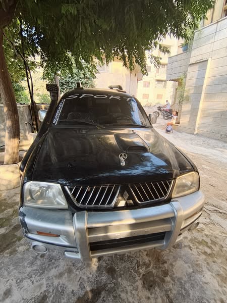 ميتسوبيشي L200 2004 - صورة 2