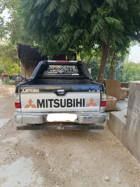 ميتسوبيشي L200 2004 - صورة 1