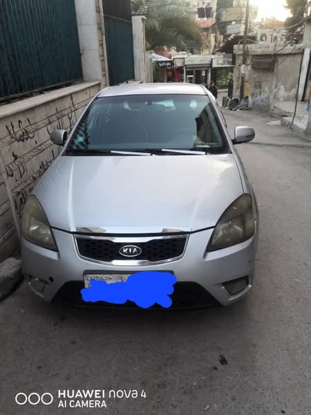 كيا ريو 2011 - صورة 1