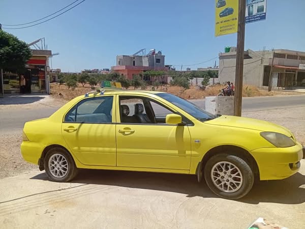 متسوبيشي لانسر 2007 - صورة 5