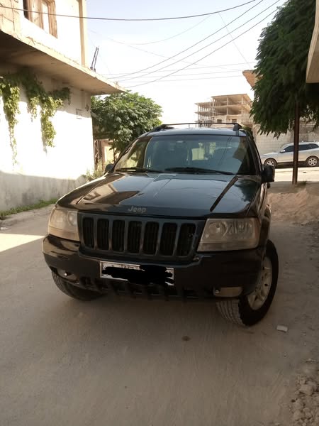 جيب شيرووكي 2000 - صورة 2