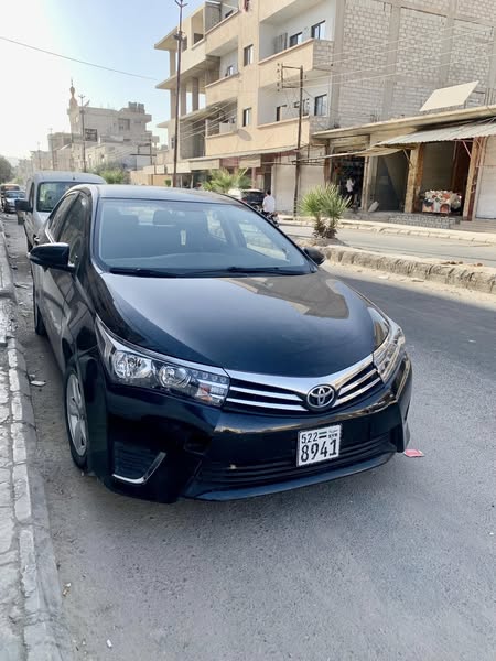 تويوتا كورولا 2014 - صورة 1