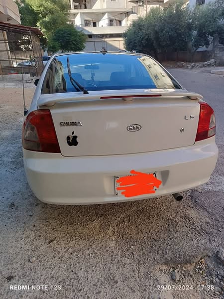 كيا شوما 2001 - صورة 1