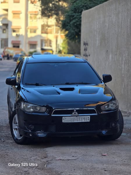 ميتسوبيشي لانسر 2010 - صورة 1