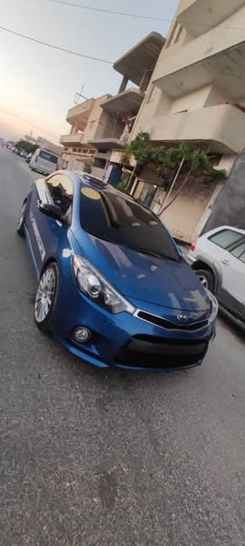 كيا سيراتو 2014 - صورة 1