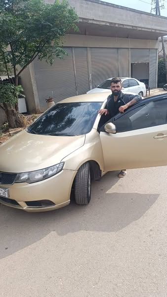 كيا فورتي 2009 - صورة 2
