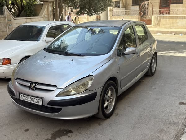 بيجو ٣٠٧ 2004 - صورة 2