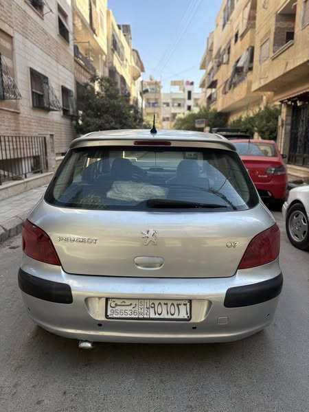 بيجو ٣٠٧ 2004 - صورة 4