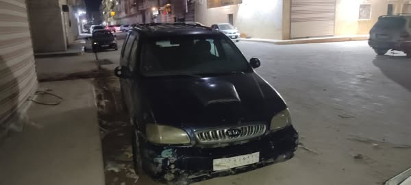 كيا كرنفال 2001 - صورة 1