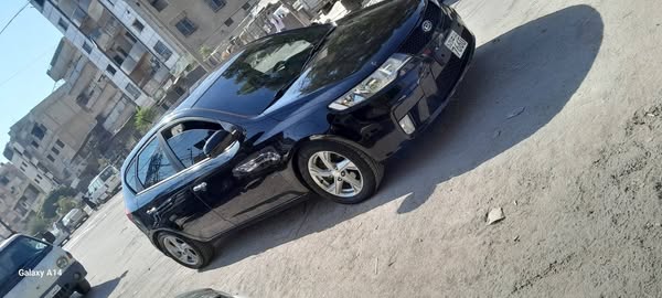 كيا فورتي 2011 - صورة 1