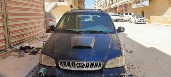 كيا كرنفال 2001 - صورة 1