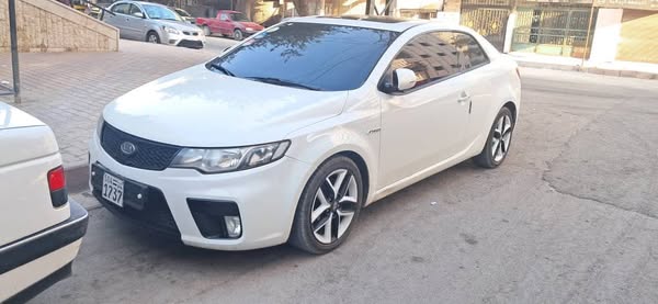 كيا فورتي كوبي 2011 - صورة 3