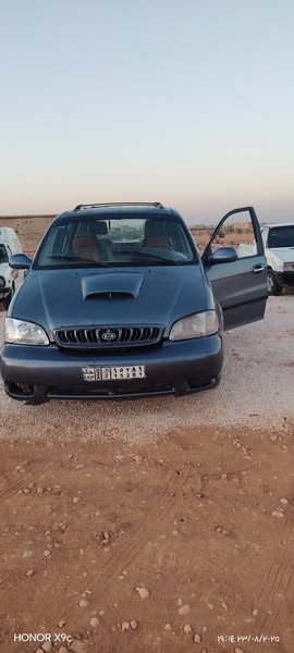 كيا كرنفان 2001 - صورة 1