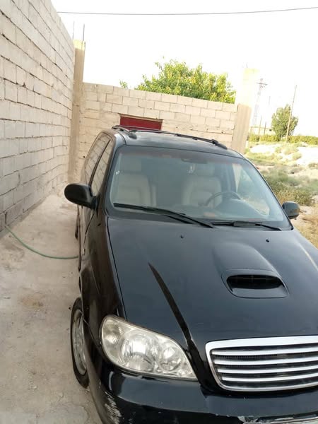 كيا كرنفال 2004 - صورة 4