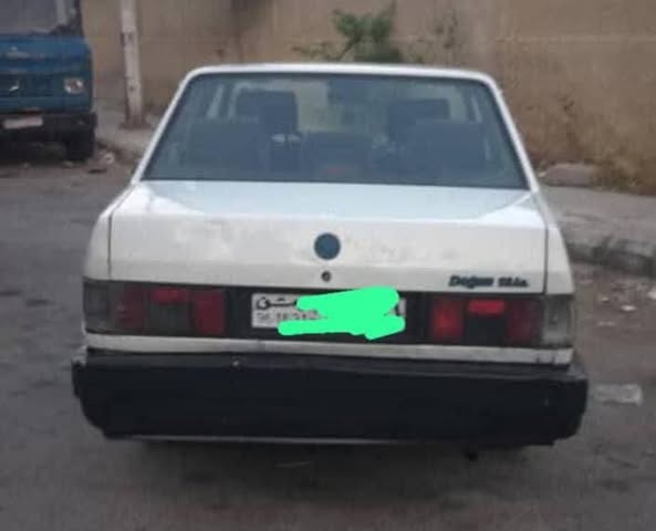 توفاش دوغان 2004 - صورة 2