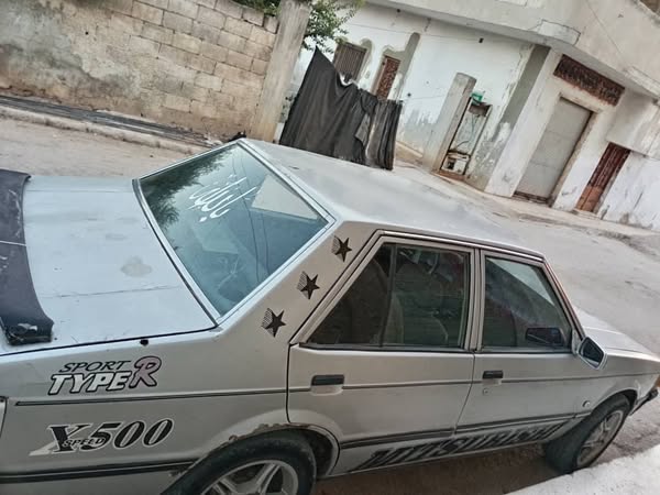 متسوبيشي لانسر 1983 - صورة 1